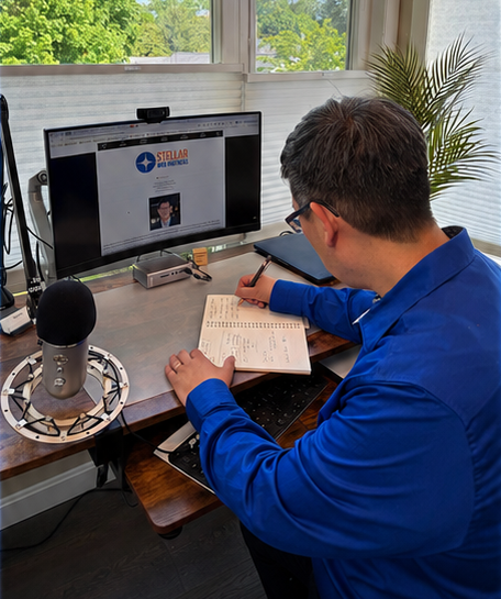 Nat Couropmitree working at his desk